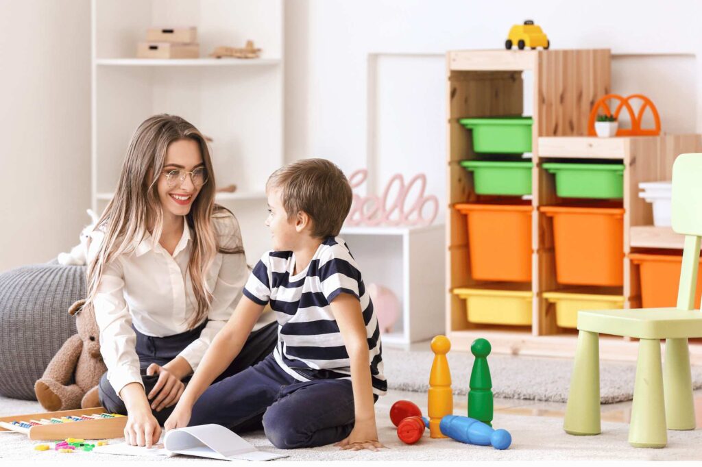 Therapist implementing a specialized ABA program at home for a child