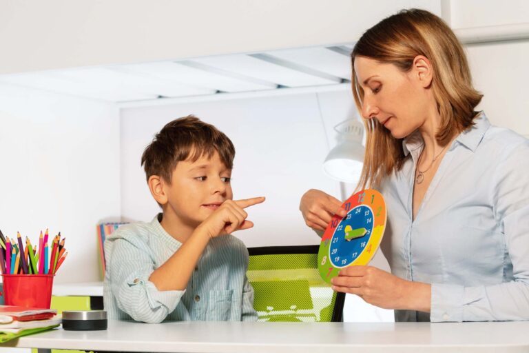 Professional evaluating a child in an ABA therapy for autism session